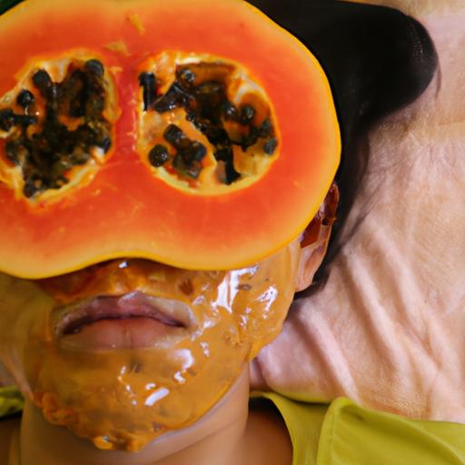 Applying a homemade papaya face mask for skin lightening.