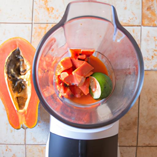 Blend the ingredients together for a refreshing papaya smoothie.