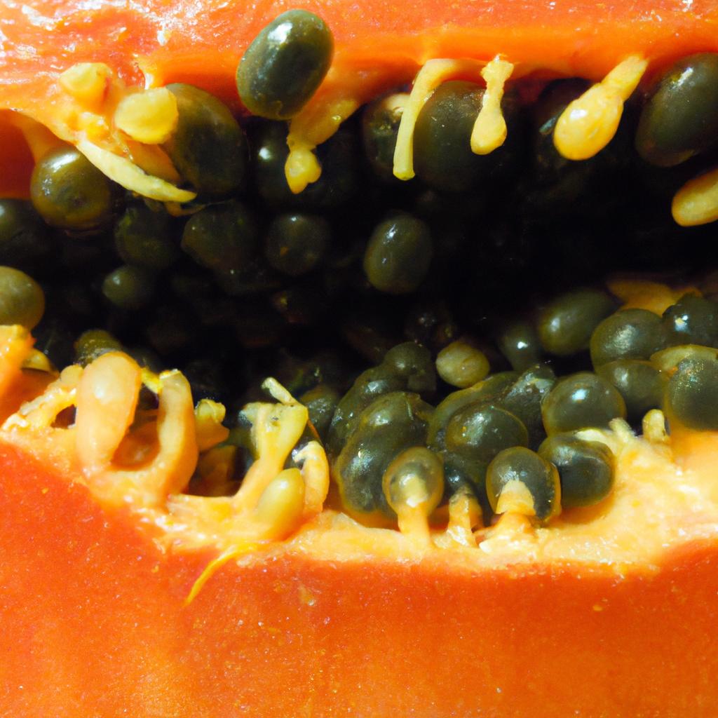 Checking the texture and seeds of a sliced papaya can help determine its ripeness