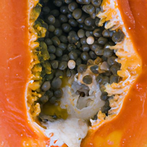 A moldy papaya with visible signs of spoilage.