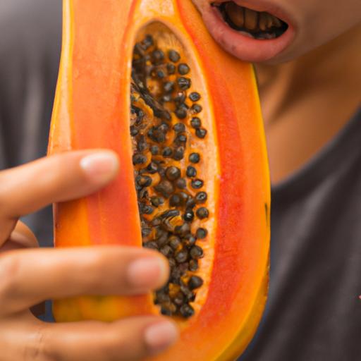 A sliced papaya that can be challenging to eat for some due to its strong odor