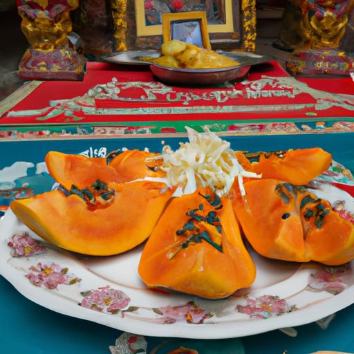 A plate of fresh papayas offered as a devotional offering in front of a Buddhist altar.