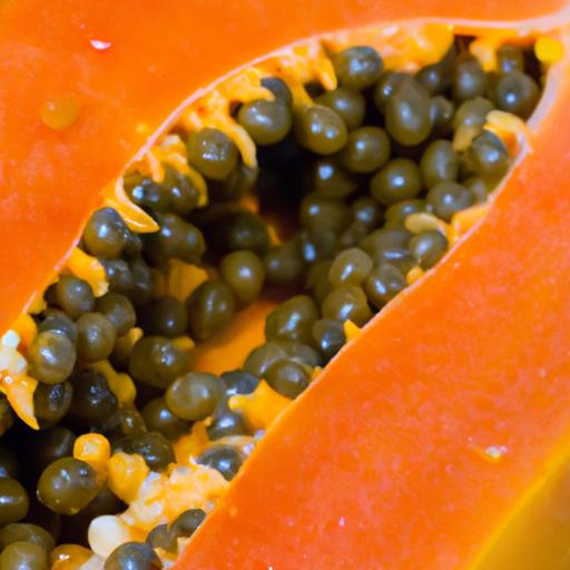 Ripe papaya fruit with vibrant orange color and unique texture.