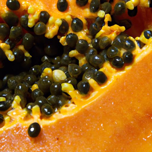 Ripe papaya with its vibrant orange flesh and black seeds.