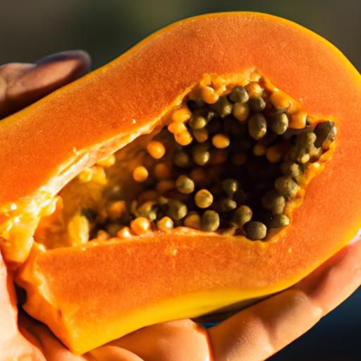 Sliced papaya fruit: Vibrant orange flesh and seeds