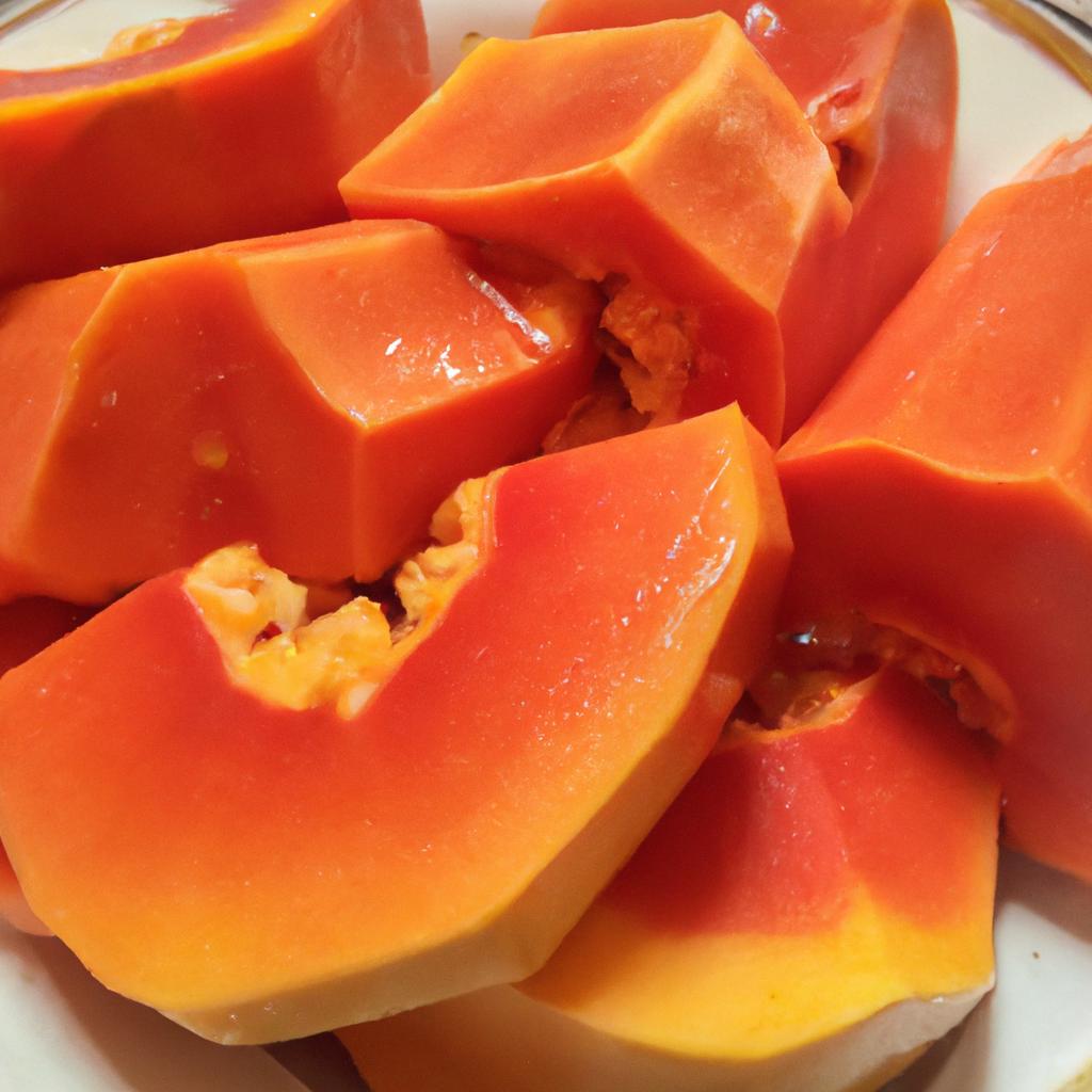 Freshly sliced papaya, a nutritious fruit that may aid in menstrual symptom relief