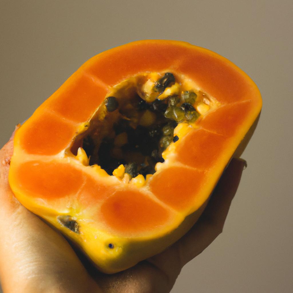 Freshly sliced papaya, known for its hair removal properties.