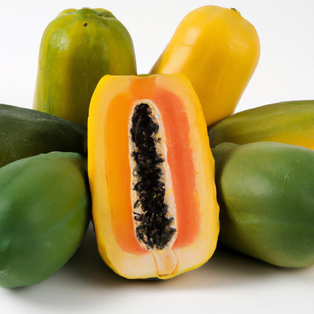 A range of papayas showing the progression of ripeness from green to fully ripe.
