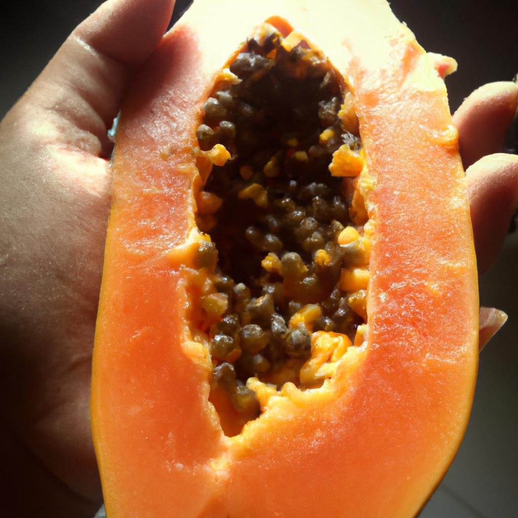 Enjoying the refreshing aroma and juicy texture of a sliced papaya